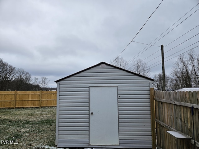 view of shed featuring a fenced backyard