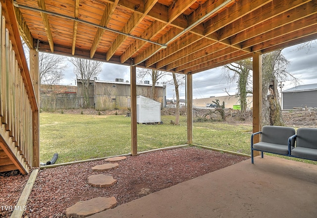 view of patio / terrace featuring fence