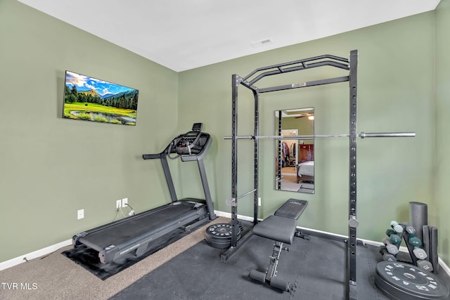 workout room with a ceiling fan, visible vents, and baseboards