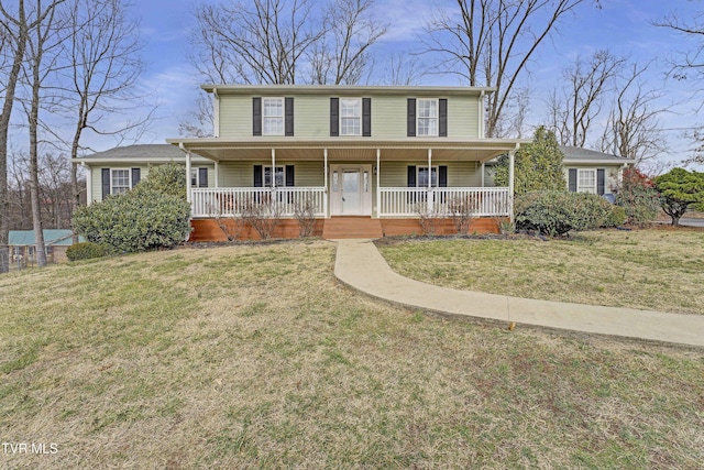 view of front of house featuring a porch and a front yard