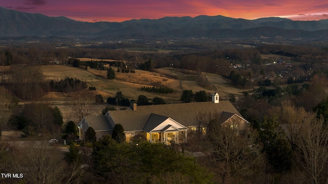 property view of mountains featuring a rural view