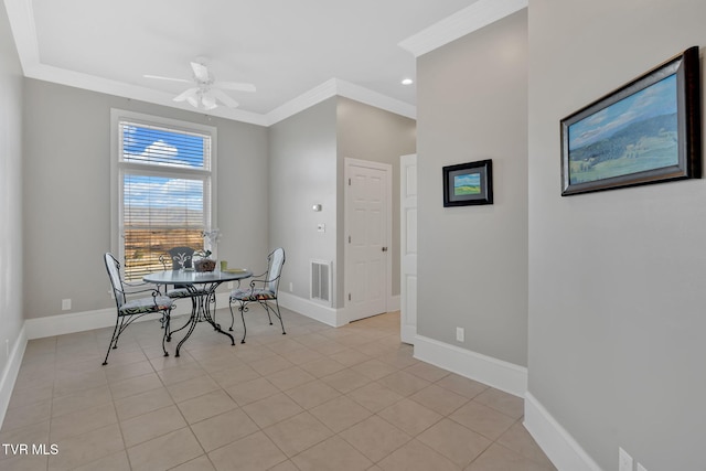 dining room with ornamental molding, light tile patterned flooring, visible vents, and baseboards