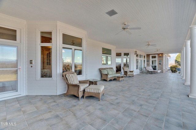 view of patio with a ceiling fan