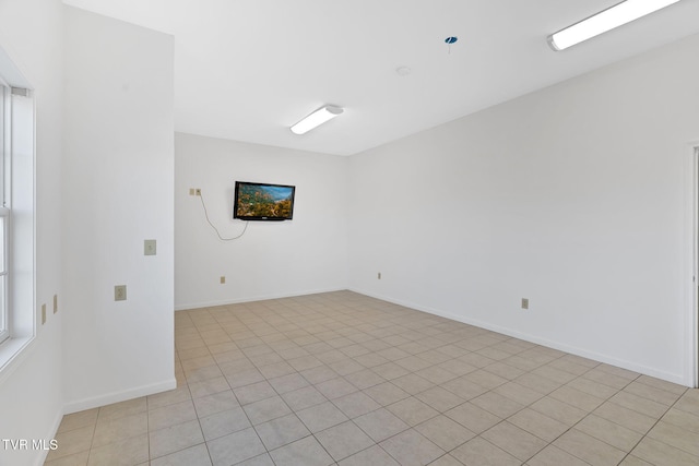 empty room with baseboards