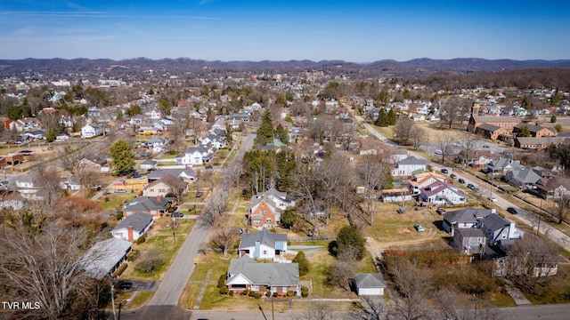 drone / aerial view with a residential view and a mountain view