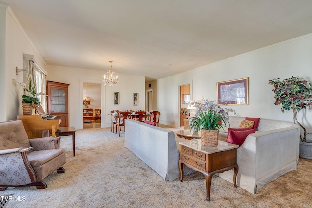 living room featuring a notable chandelier, carpet flooring, and crown molding