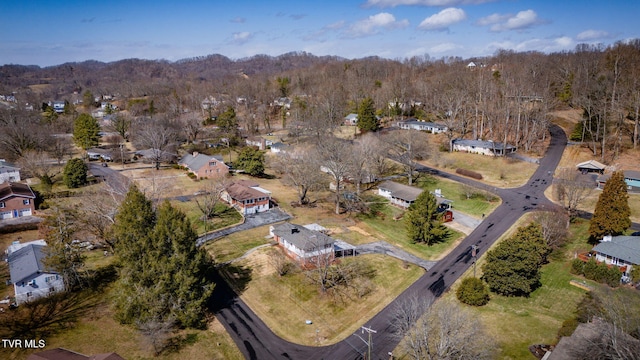 aerial view with a residential view and a wooded view