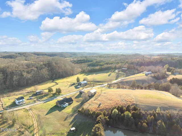 aerial view with a rural view and a view of trees