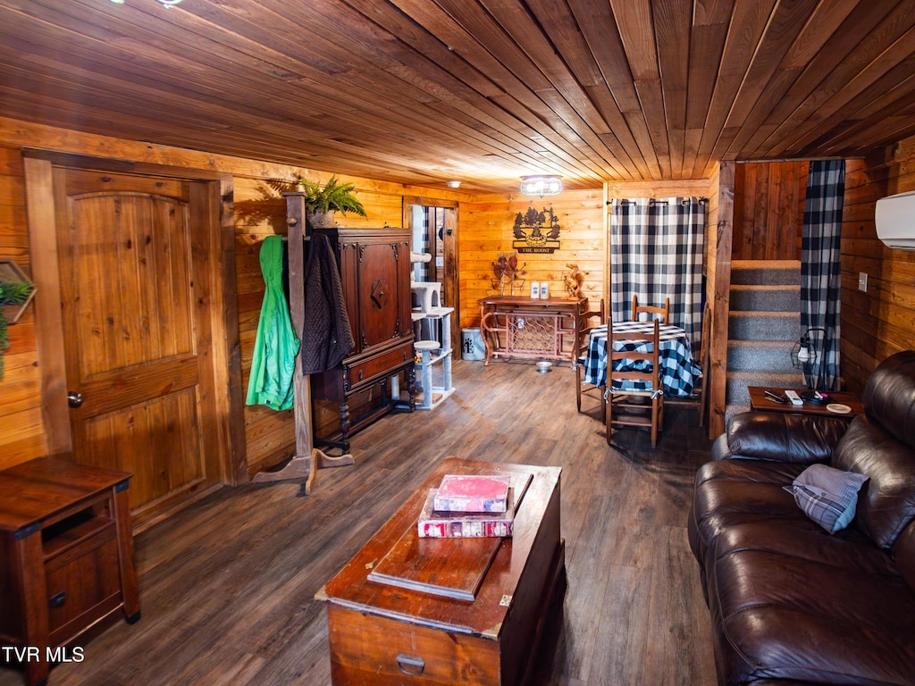472 Buzzard Roost Rd, Bulls Gap, TN 37711 - living room with wooden walls, wood finished floors, and wooden ceiling