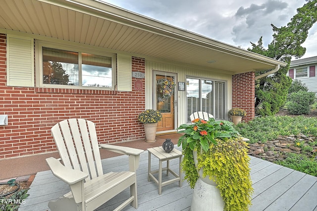 exterior space with brick siding