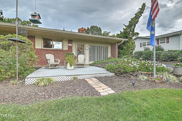 view of front of house featuring brick siding