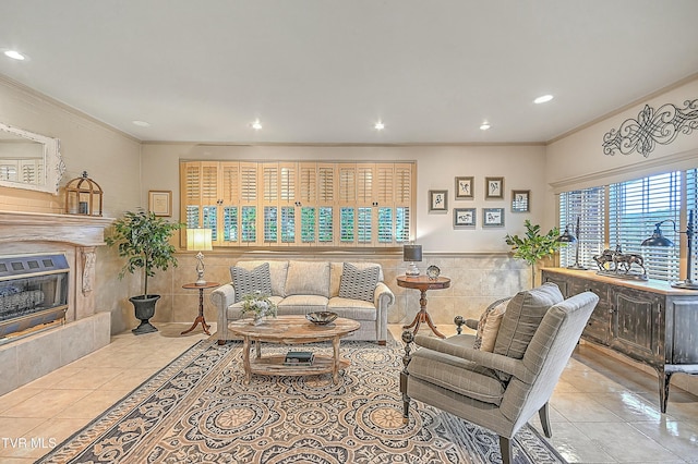 living area featuring ornamental molding, tile patterned flooring, tile walls, and a premium fireplace