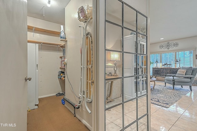 interior space with light tile patterned floors