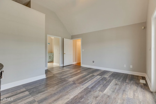 unfurnished bedroom featuring high vaulted ceiling, visible vents, baseboards, and dark wood-type flooring