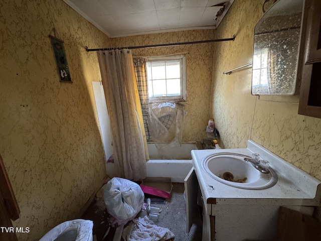 full bathroom featuring shower / bathtub combination with curtain, crown molding, vanity, and wallpapered walls