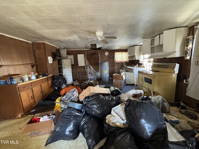 kitchen with washer / dryer, wooden walls, electric water heater, open shelves, and white range with electric cooktop