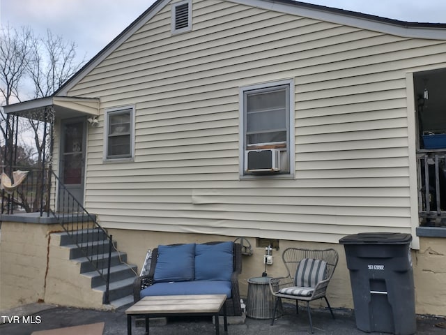 back of house with a patio area and cooling unit