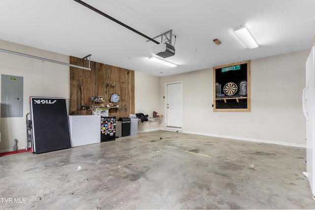 garage with a garage door opener, refrigerator, electric panel, and baseboards