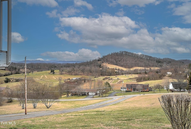 view of mountain feature with a rural view