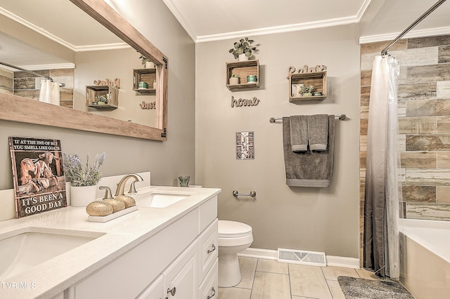 full bath featuring curtained shower, toilet, a sink, visible vents, and crown molding