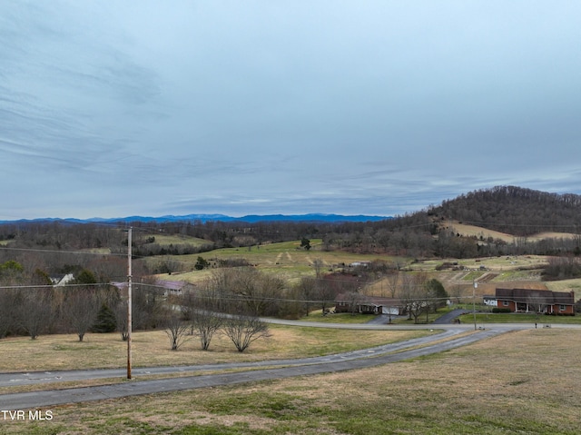 view of mountain feature with a rural view