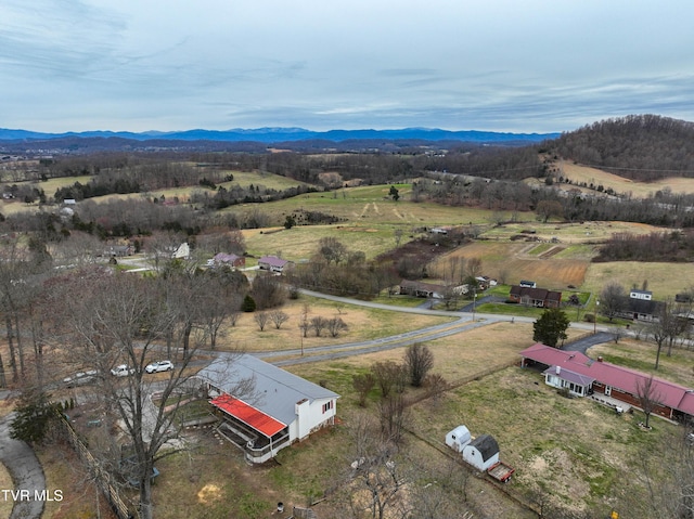 aerial view featuring a rural view and a mountain view