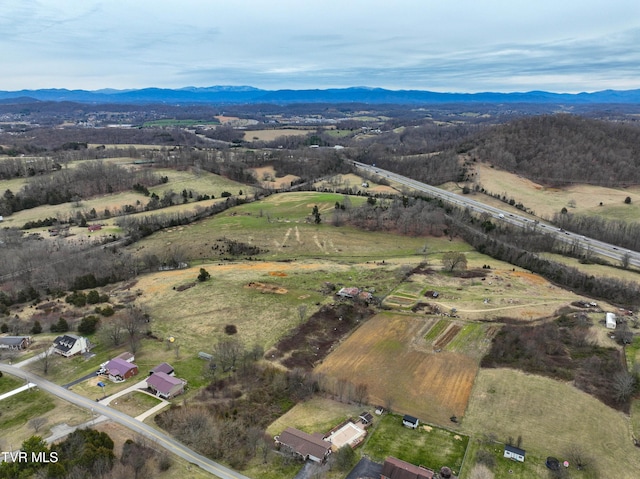 bird's eye view with a rural view and a mountain view