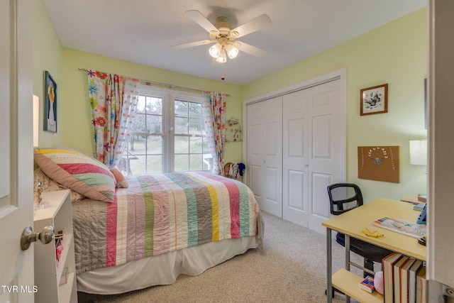 bedroom featuring carpet, ceiling fan, and a closet