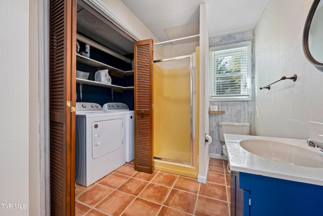 full bath with tile patterned floors, toilet, a stall shower, a closet, and vanity