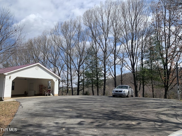 view of street featuring driveway