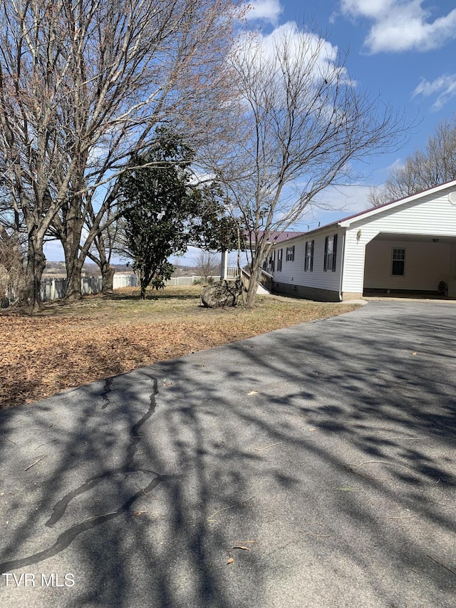 exterior space featuring driveway