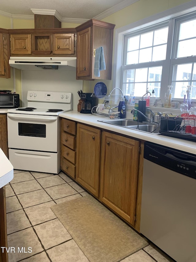 kitchen with crown molding, white range with electric cooktop, under cabinet range hood, dishwasher, and a sink