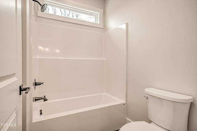 full bath featuring toilet and shower / washtub combination