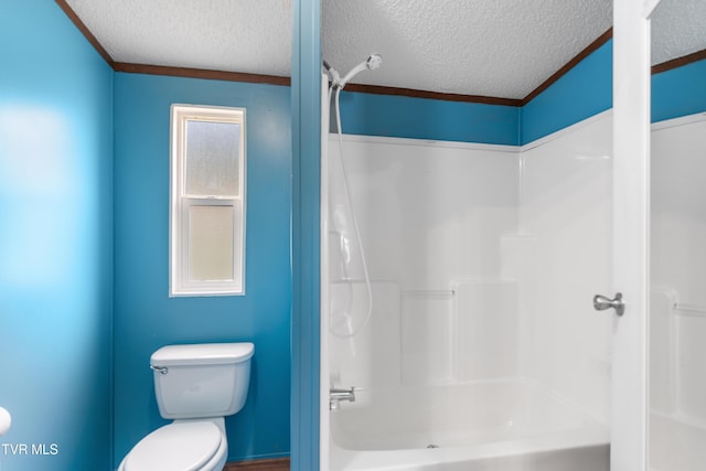 full bath with toilet, a textured ceiling, and shower / bathing tub combination