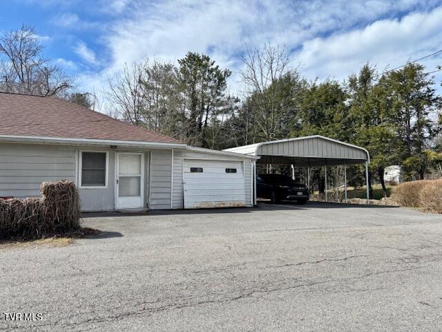 garage with driveway