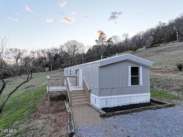 manufactured / mobile home featuring a deck