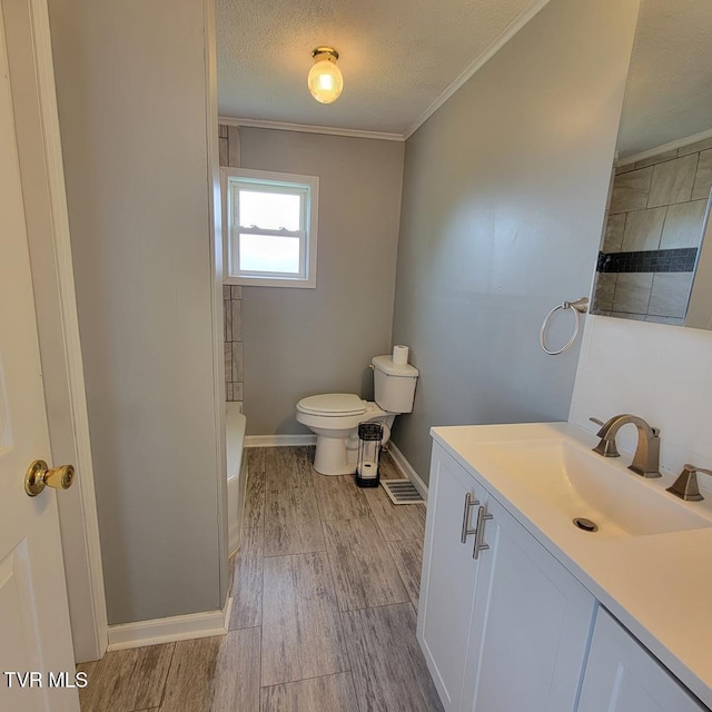 204 Highland Ave, Glade Spring, VA 24340 - bathroom with vanity, wood finished floors, a textured ceiling, crown molding, and a shower