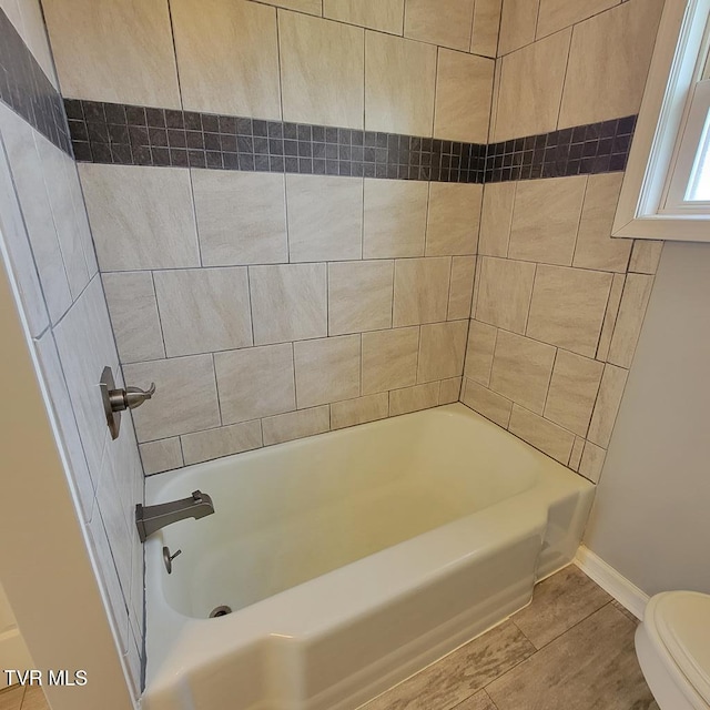 204 Highland Ave, Glade Spring, VA 24340 - bathroom with shower / washtub combination and wood finished floors