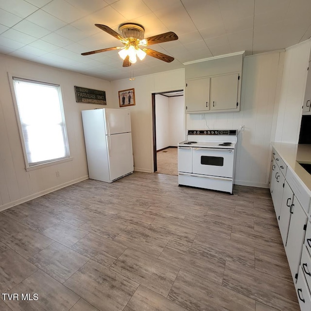 204 Highland Ave, Glade Spring, VA 24340 - kitchen featuring white appliances, a ceiling fan, light countertops, and white cabinetry