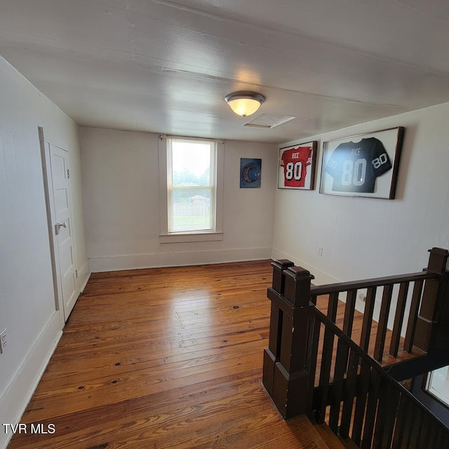 204 Highland Ave, Glade Spring, VA 24340 - unfurnished room with wood-type flooring and baseboards