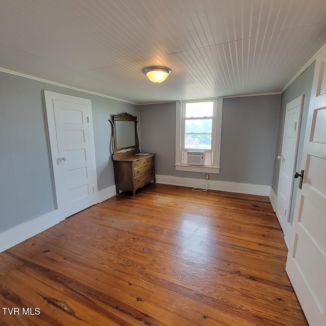 204 Highland Ave, Glade Spring, VA 24340 - empty room with crown molding, wood-type flooring, and cooling unit