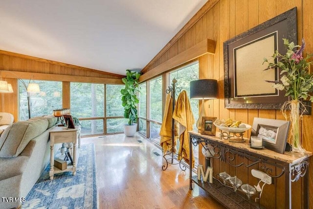 sunroom / solarium with vaulted ceiling