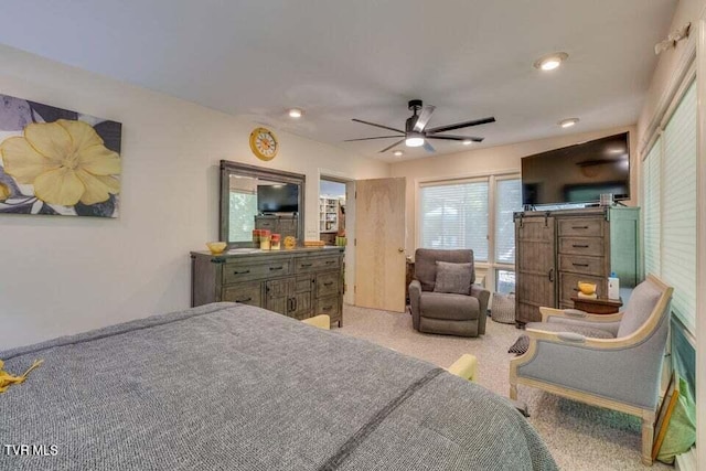 carpeted bedroom featuring recessed lighting and ceiling fan