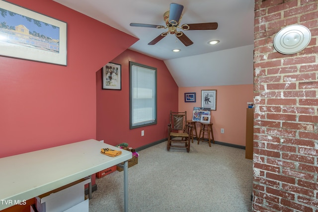 interior space with a ceiling fan, recessed lighting, vaulted ceiling, and baseboards