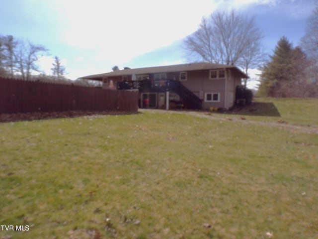 view of yard featuring stairway