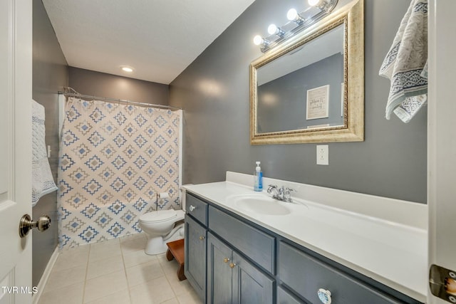 bathroom featuring tile patterned flooring, curtained shower, toilet, and vanity