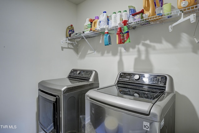 laundry area featuring laundry area and independent washer and dryer