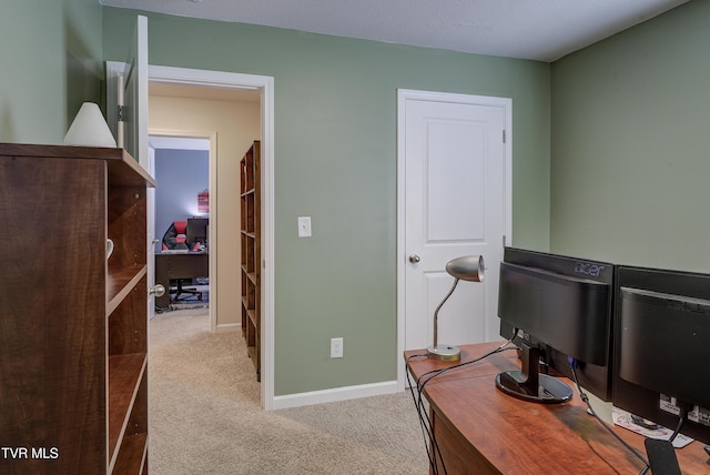 office area with baseboards and carpet