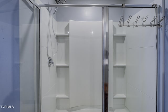 full bathroom with a shower stall