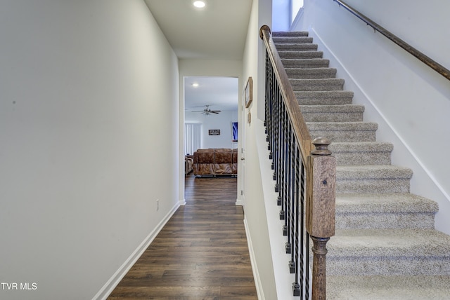 staircase featuring recessed lighting, wood finished floors, baseboards, and ceiling fan